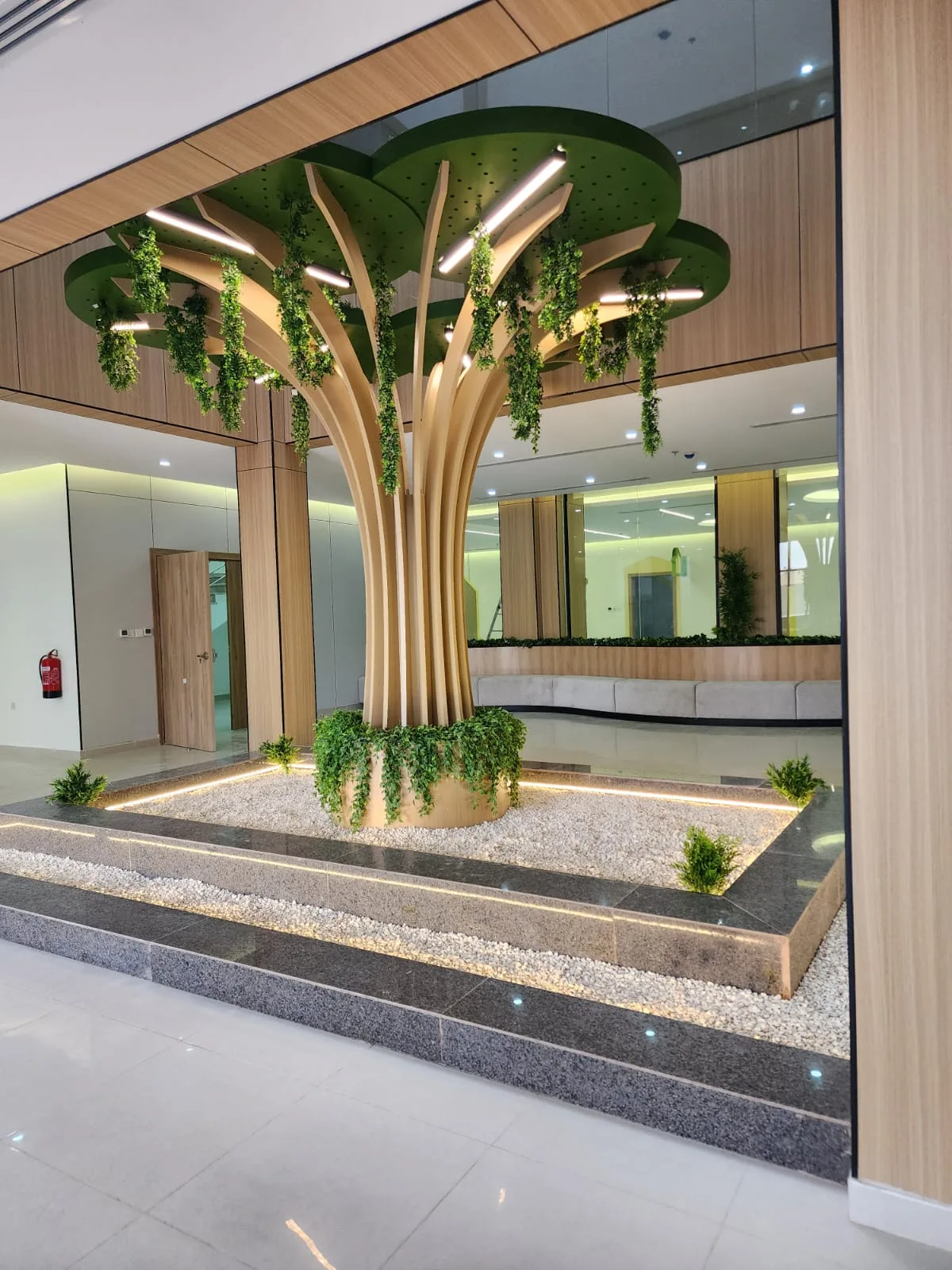 The atrium once the timber sculpture, lighting and planting were complete and the floor polished